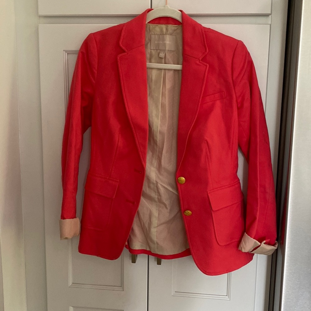 Hot pink jacket with gold detail